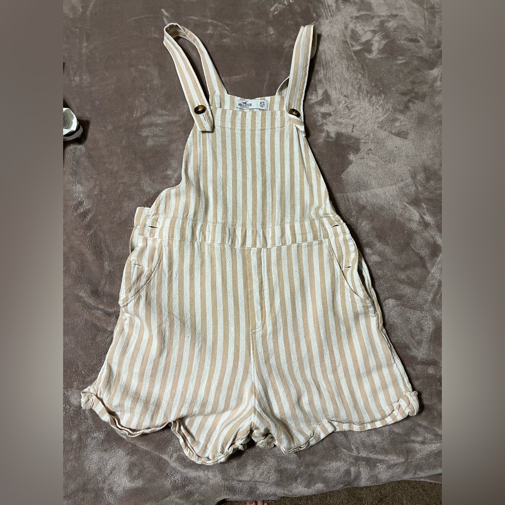Size small tan and white striped American eagle romper